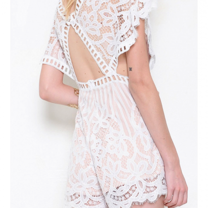 White Lace Romper Featuring Plunging Neckline,..